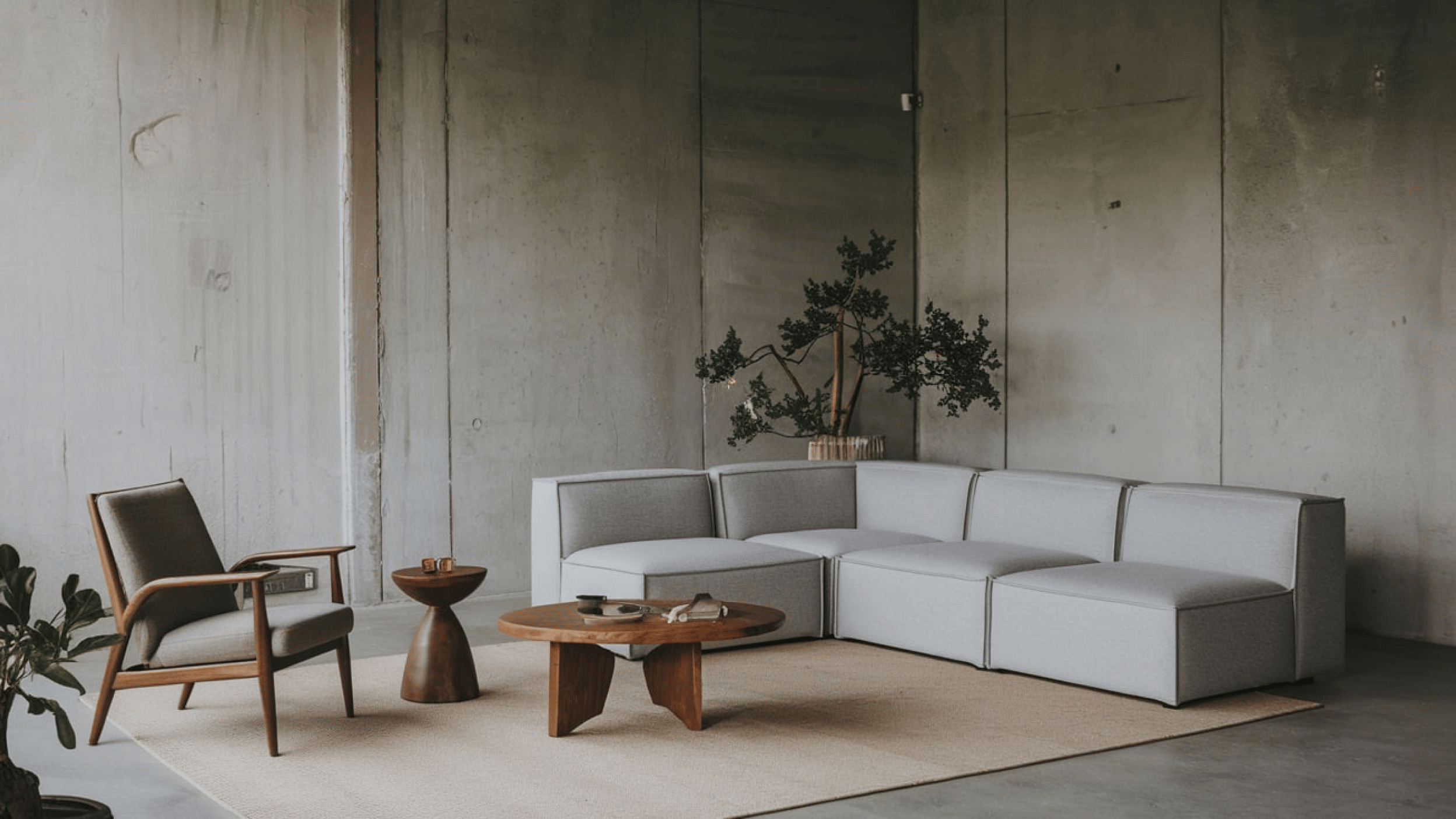 Living room with brown armchair and gray corner sofa